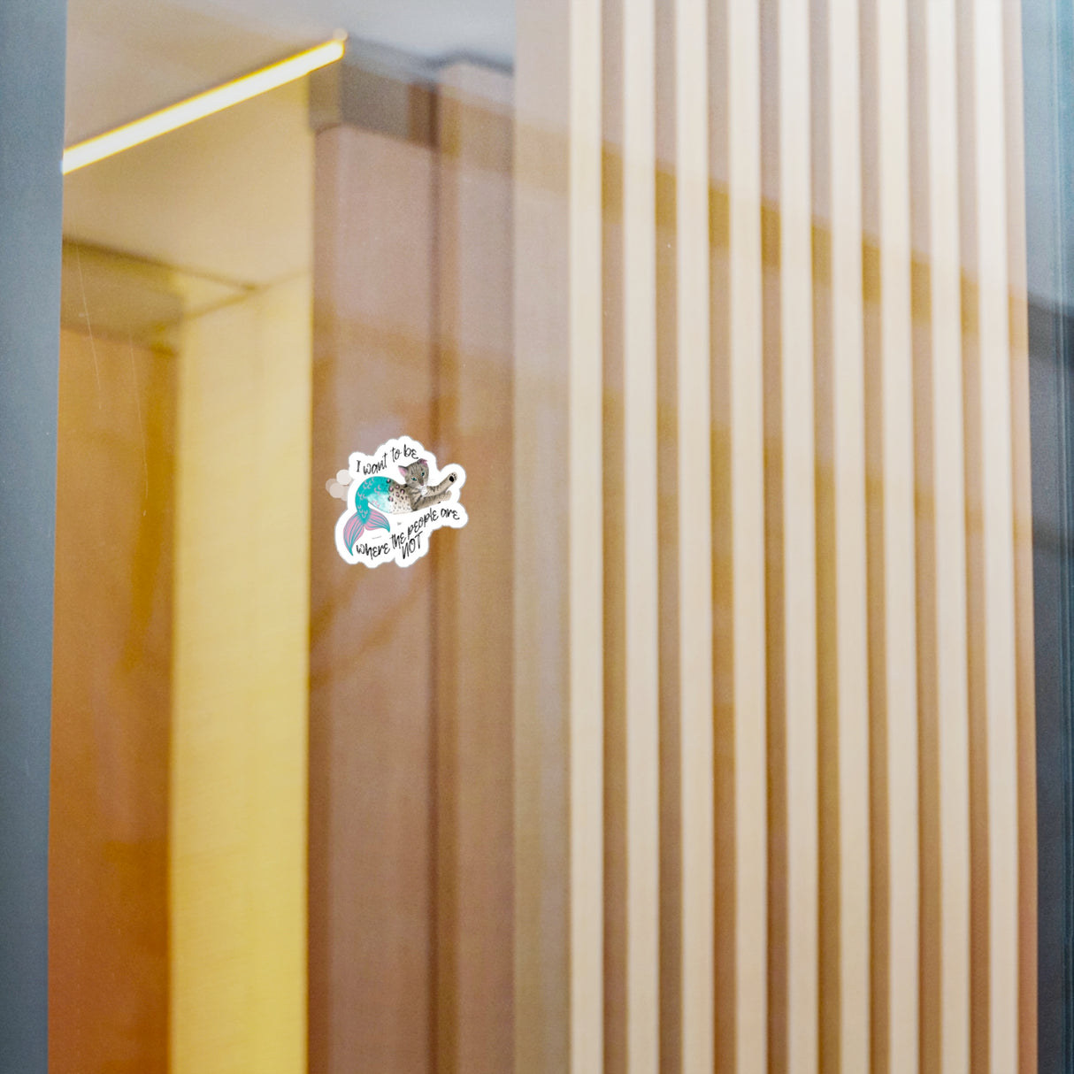 Kiss-Cut Vinyl DSticker featuring Flounder the Purrmaid that says "I want to be where the people are NOT"