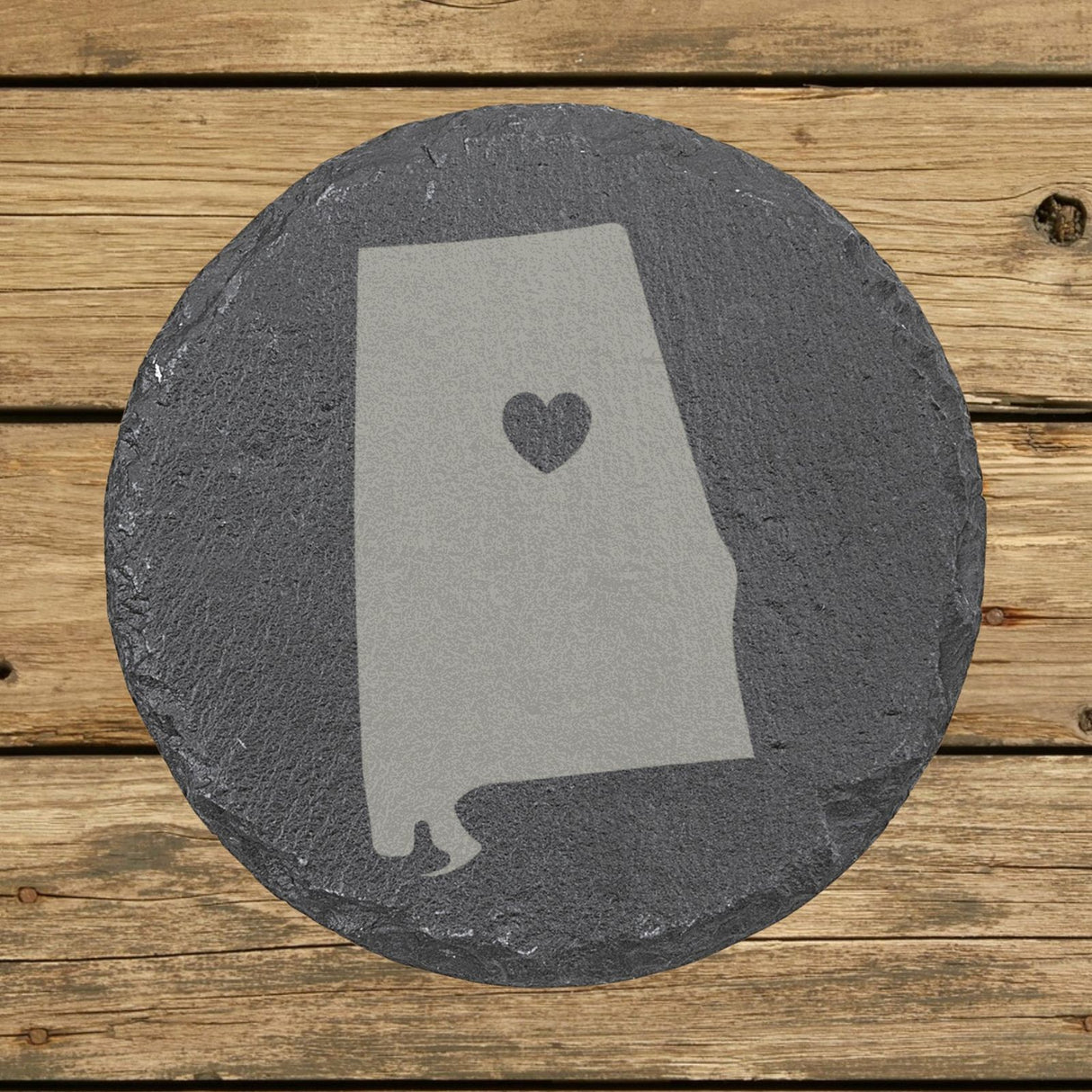 Alabama round slate coaster engraved with the state shape and a heart