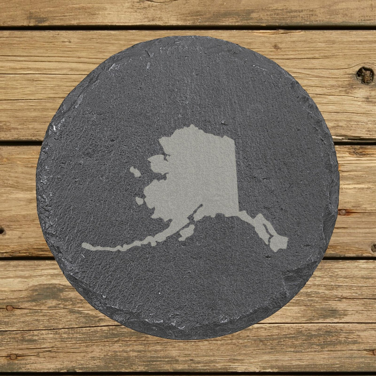 Alaska round slate coaster with the full state shape engraved