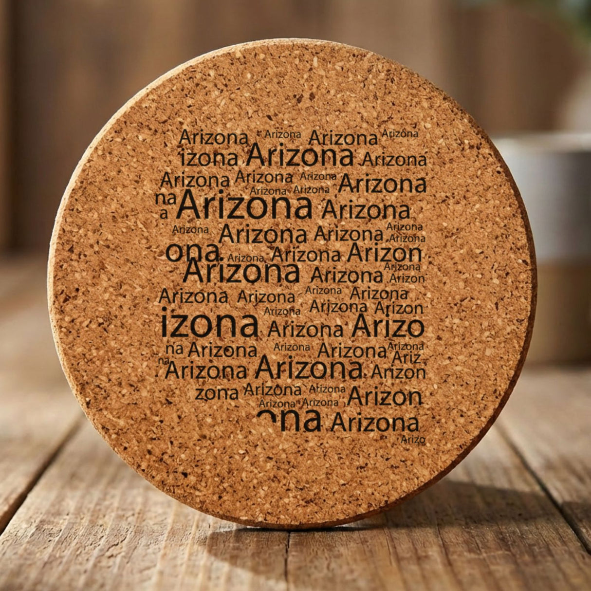 Arizona round cork coaster engraved with a word cloud of repeating Arizona text