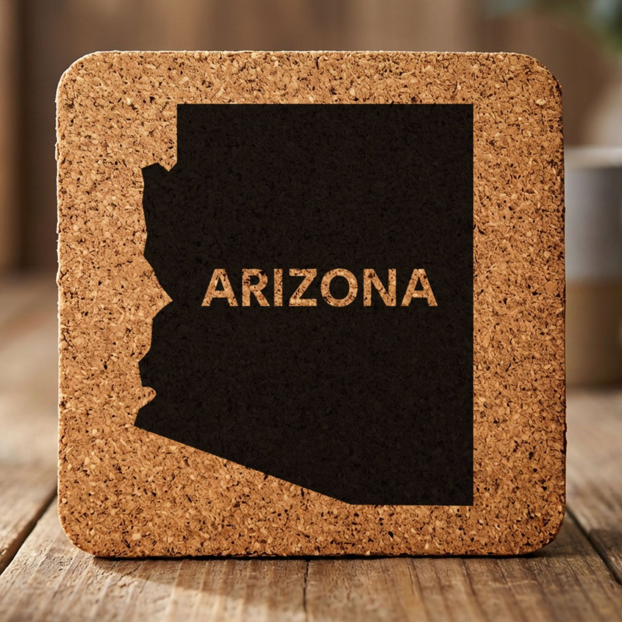 Arizona square cork coaster engraved with the state shape and ARIZONA in bold lettering