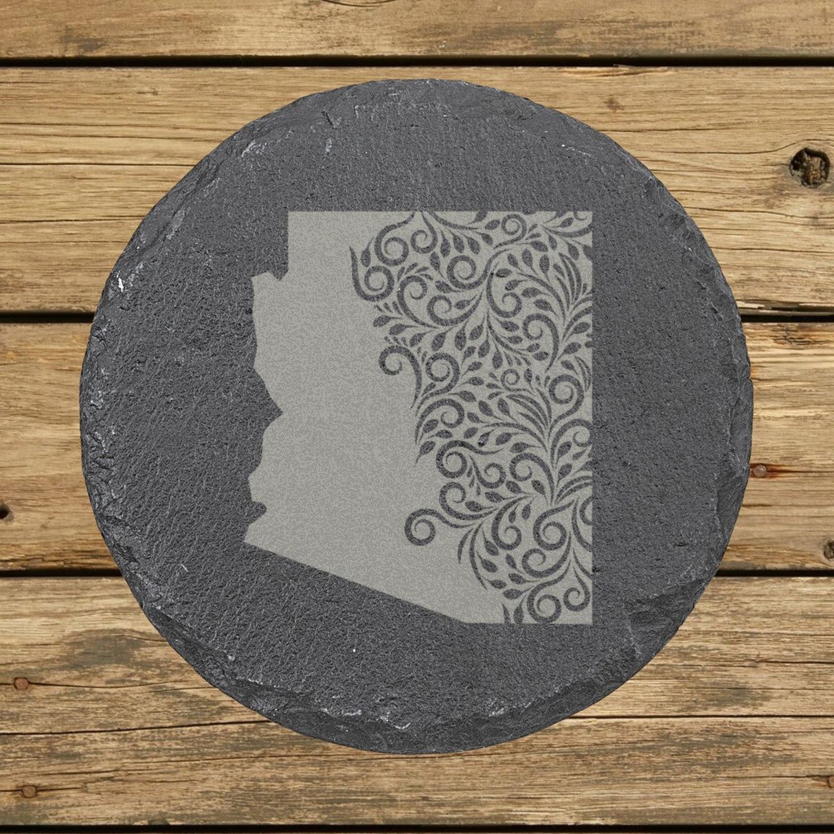 Arizona round slate coaster engraved with the state shape in ornate floral scrollwork