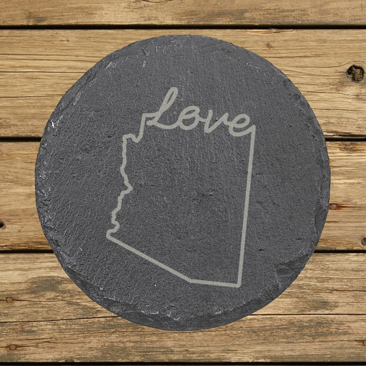 Arizona round slate coaster engraved with a hand-drawn state outline and love in cursive