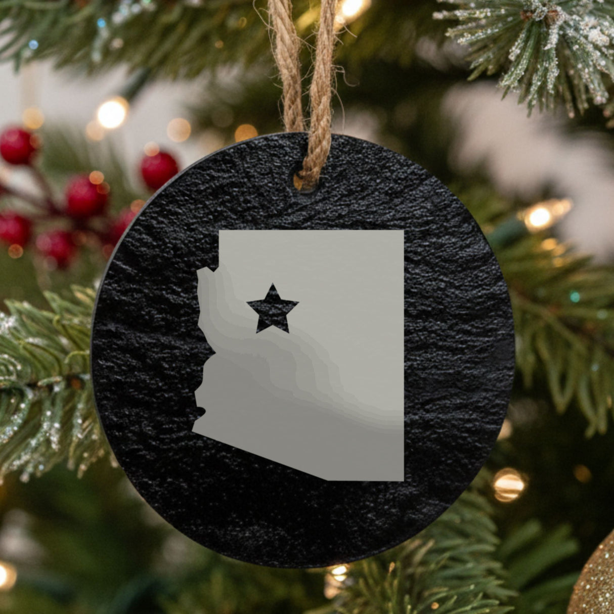Arizona round slate Christmas ornament engraved with the state shape and a star