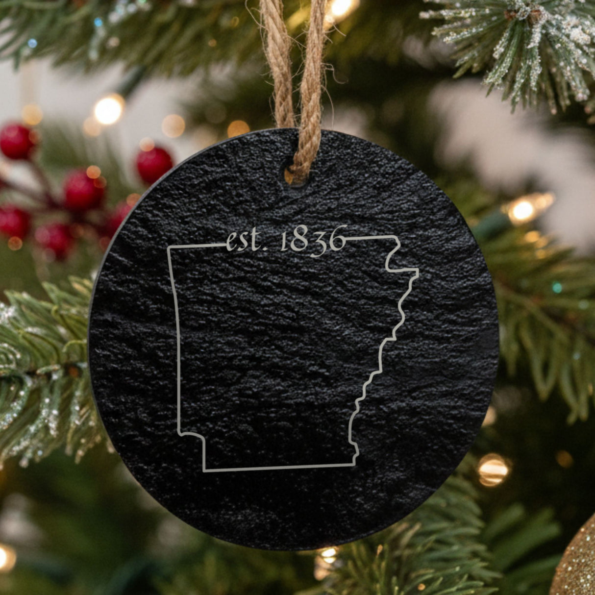 Arkansas round slate Christmas ornament engraved with the state outline and est. 1836