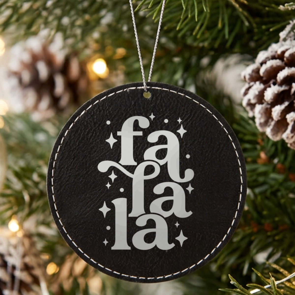 Black leatherette Christmas ornament engraved with Fa La La