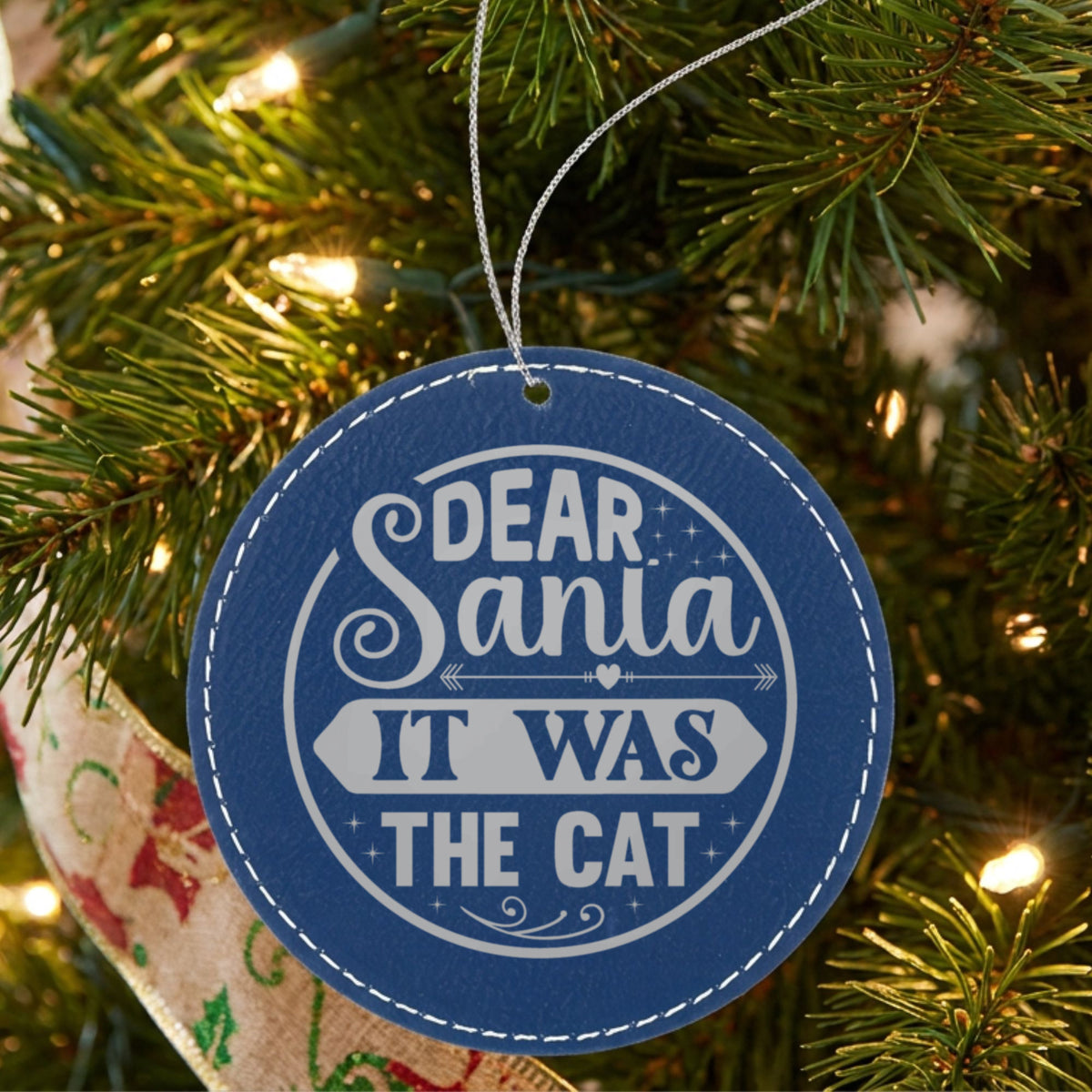 Blue leatherette Christmas ornament engraved with Dear Santa, It Was the Cat