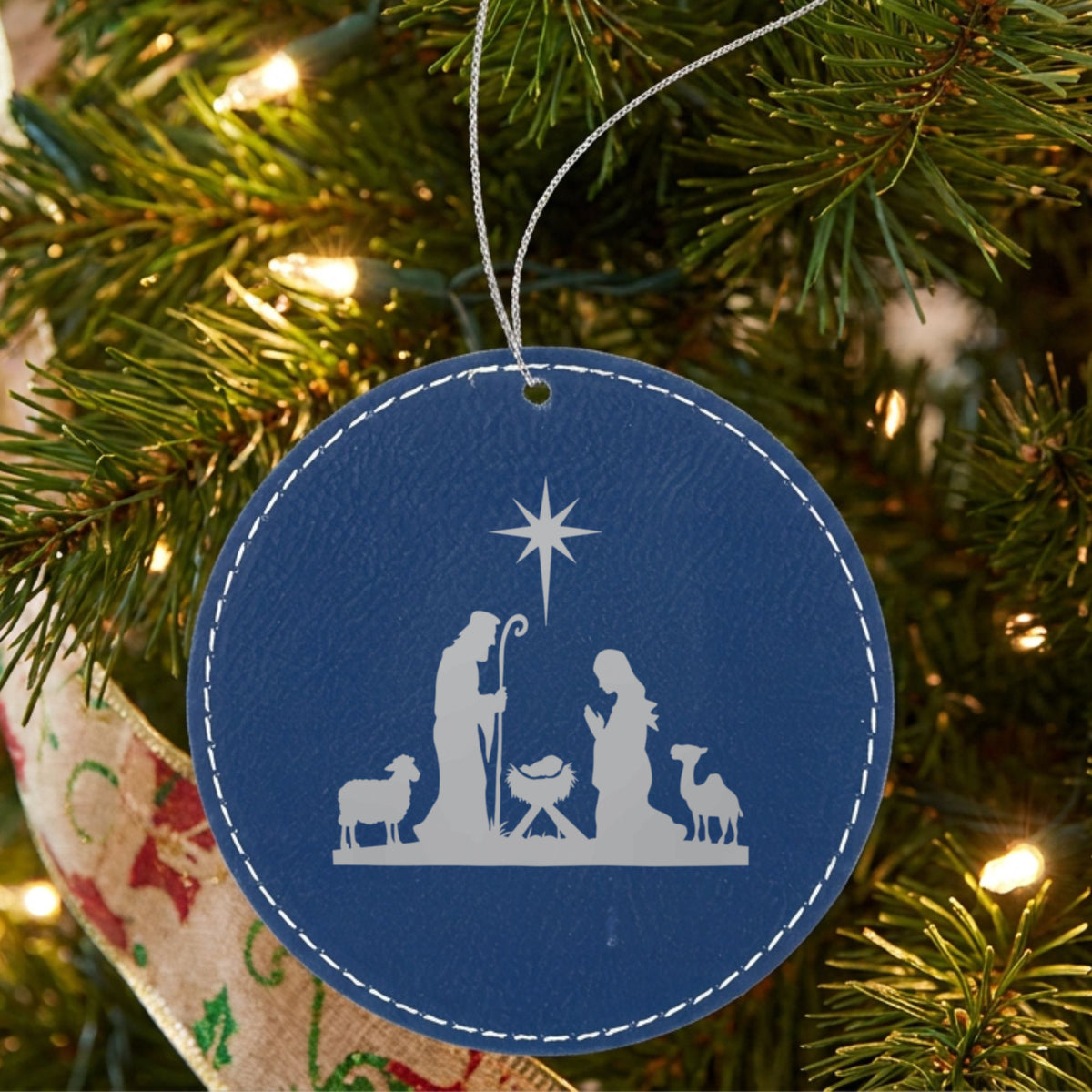 Blue leatherette Christmas ornament engraved with Nativity Scene, Classic design