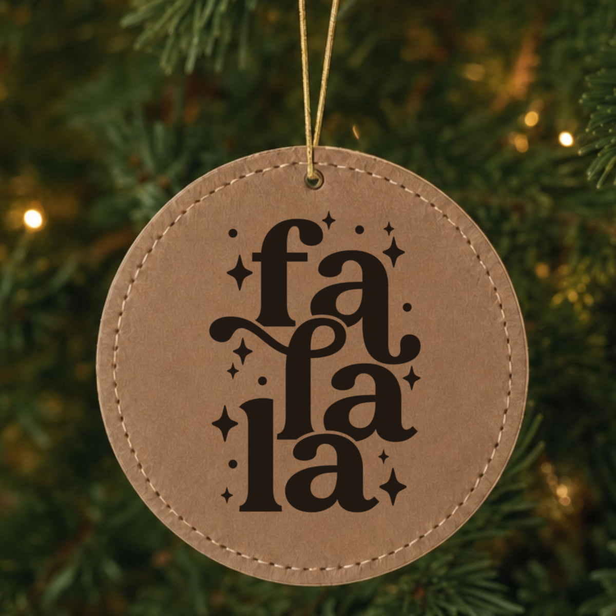 Brown leatherette Christmas ornament engraved with Fa La La