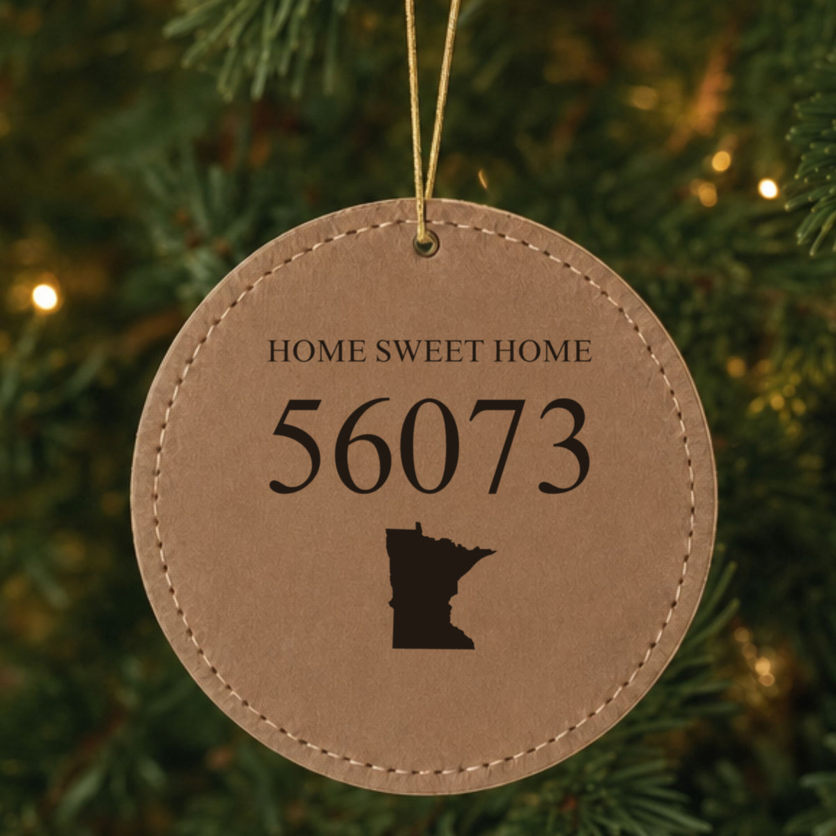 Brown leatherette Christmas ornament laser engraved with the Home Sweet Home State zip code design