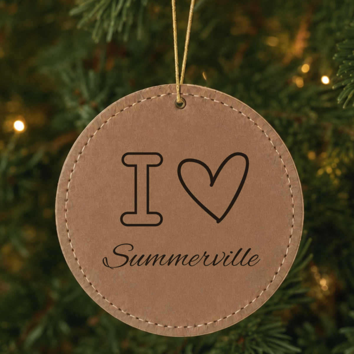 Brown leatherette Christmas ornament laser engraved with the I Heart Your City design