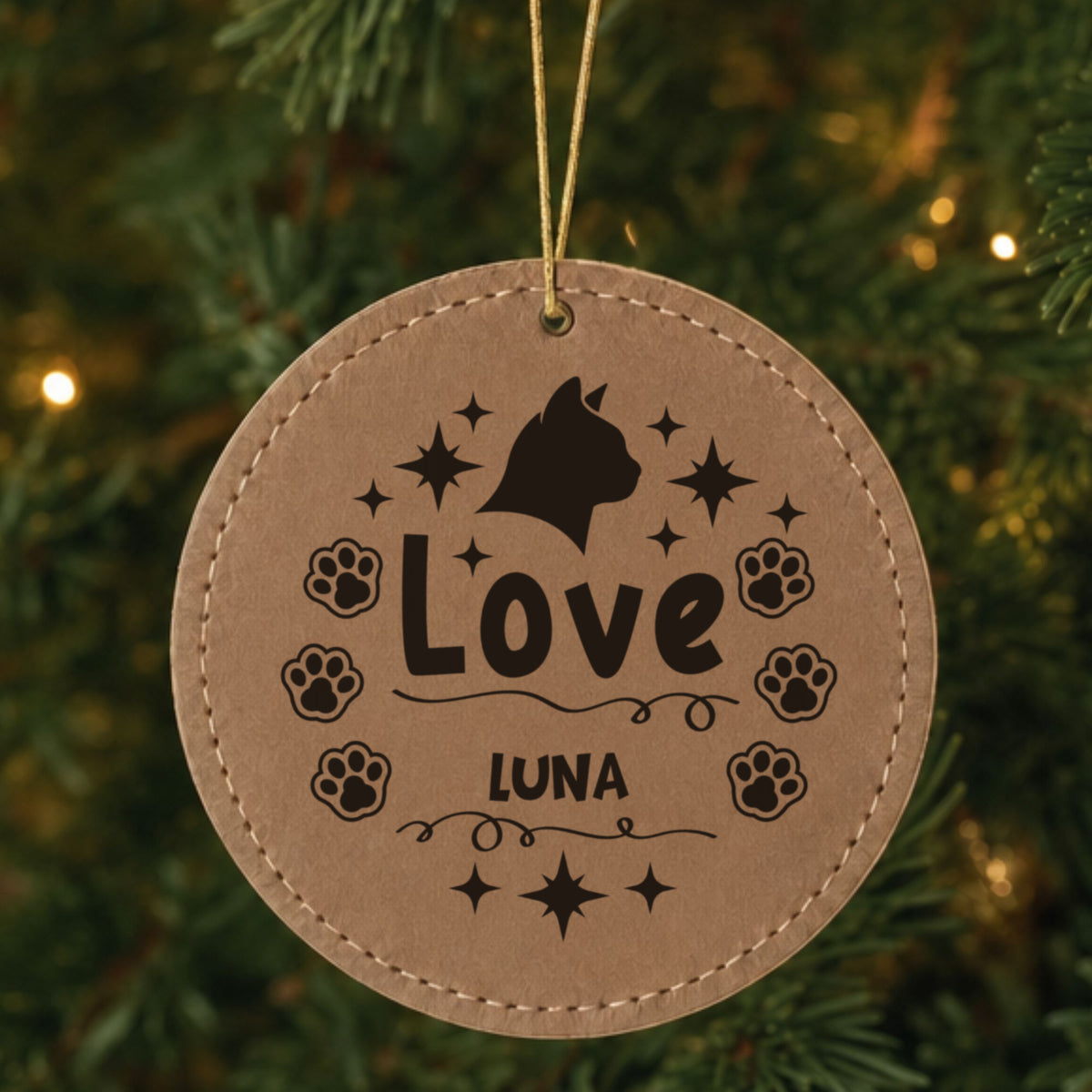 Brown leatherette Christmas ornament engraved with the Love cat design and a sample pet name
