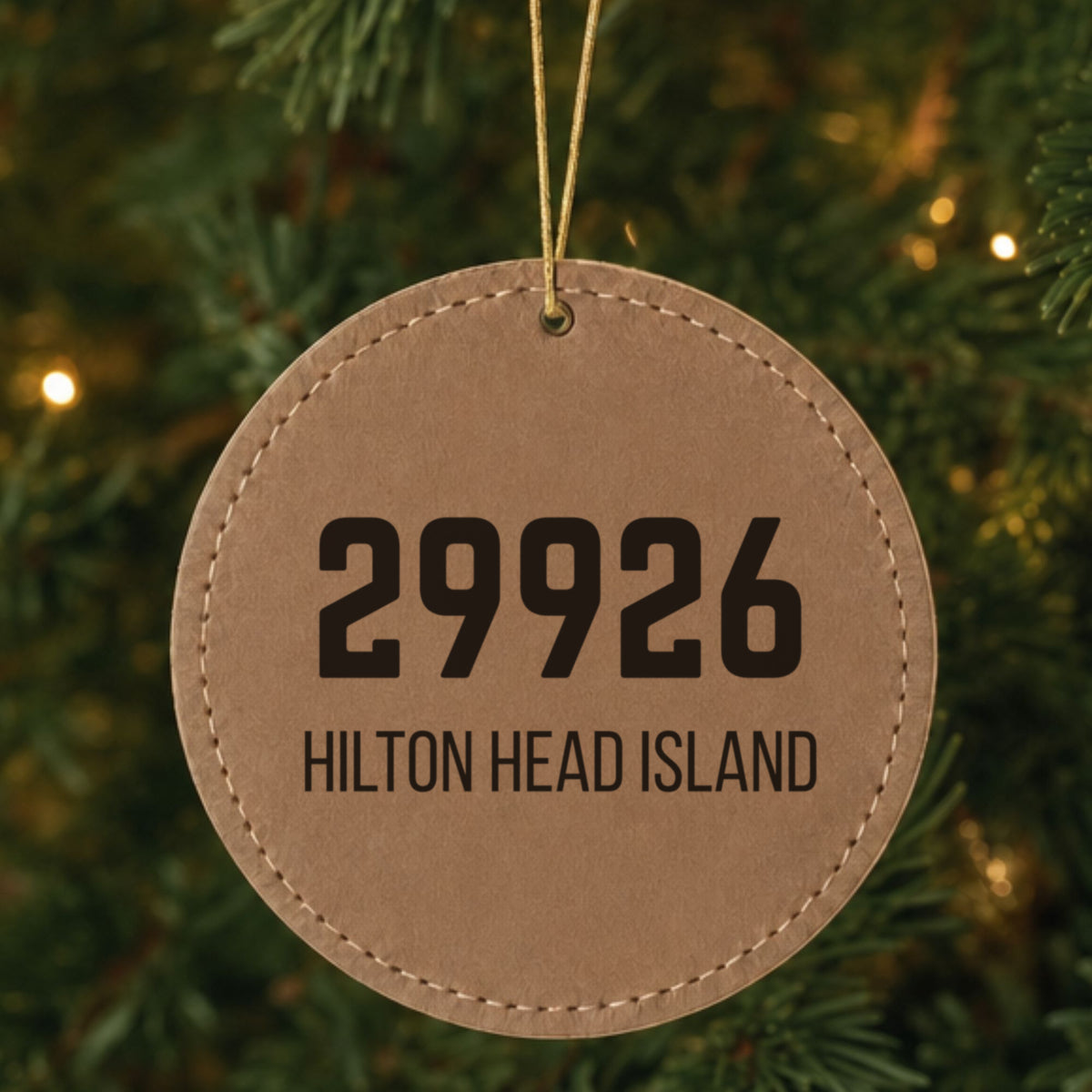 Brown leatherette Christmas ornament laser engraved with the Bold Zip zip code design