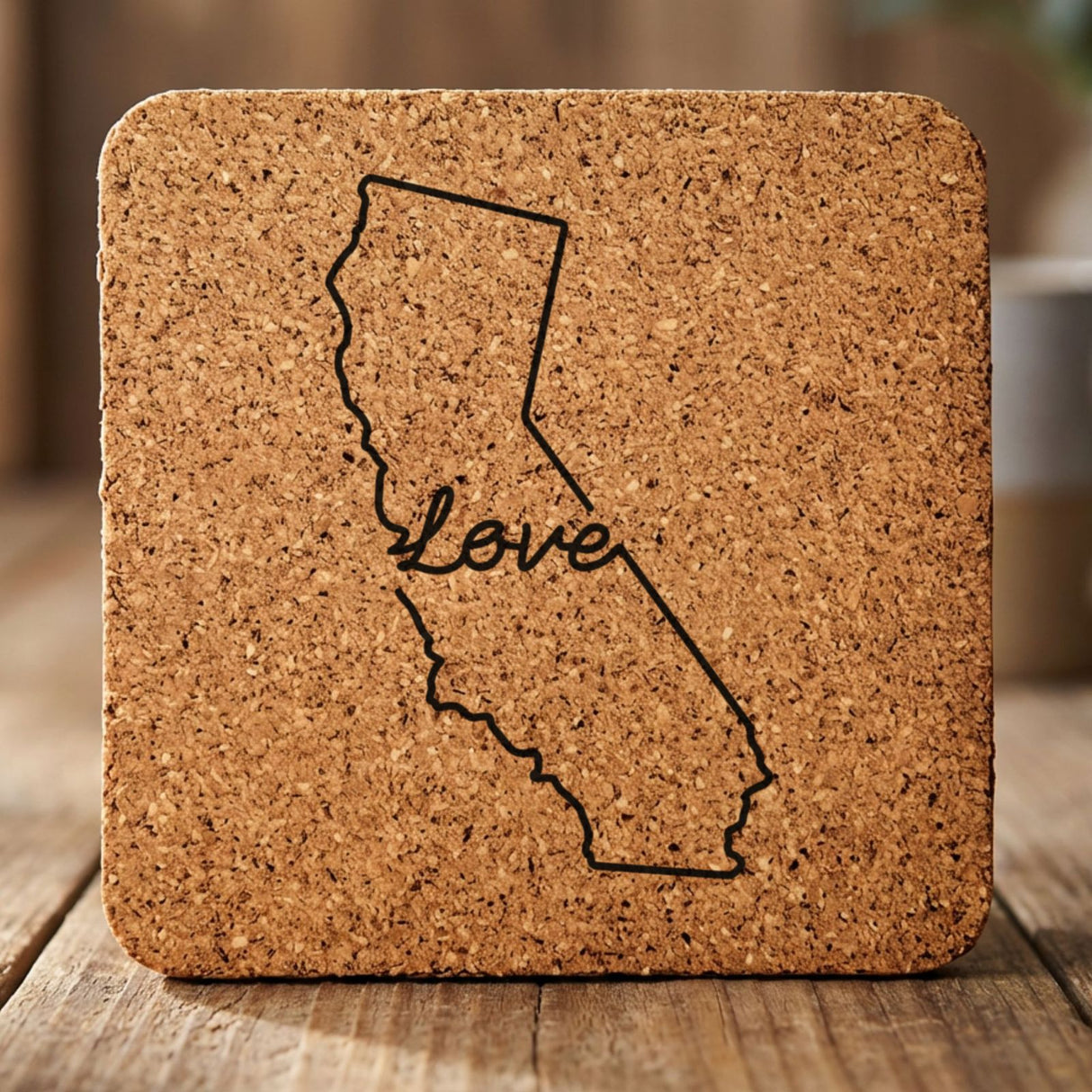 California square cork coaster engraved with a hand-drawn state outline and love in cursive