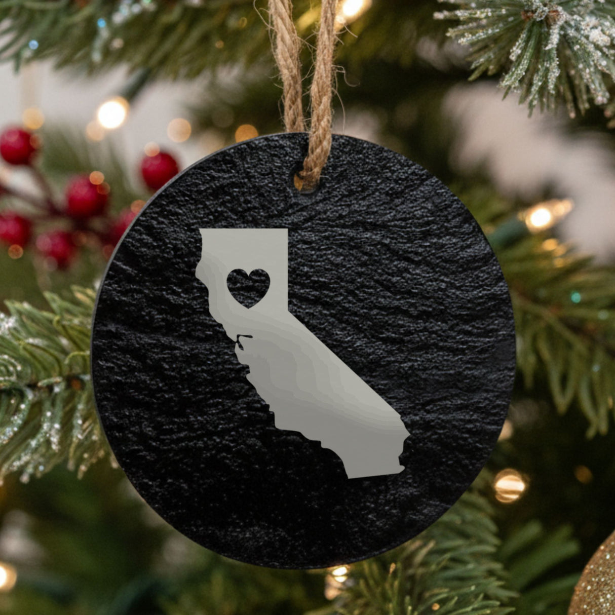 California round slate Christmas ornament engraved with the state shape and a heart