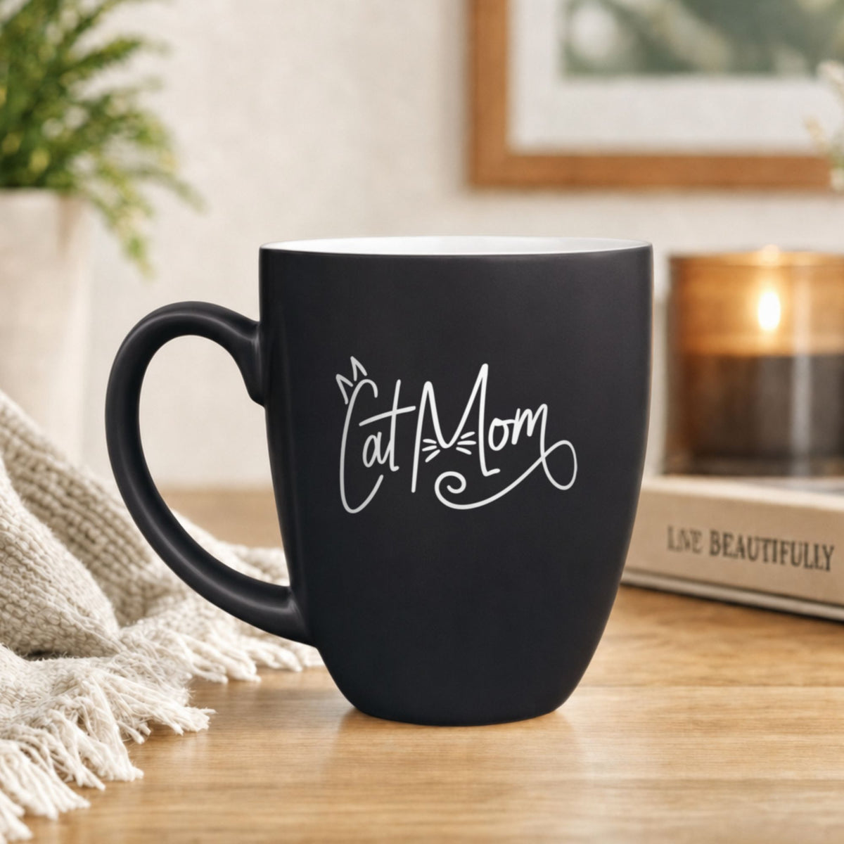 16 oz black ceramic coffee mug with "Cat Mom (Script)"