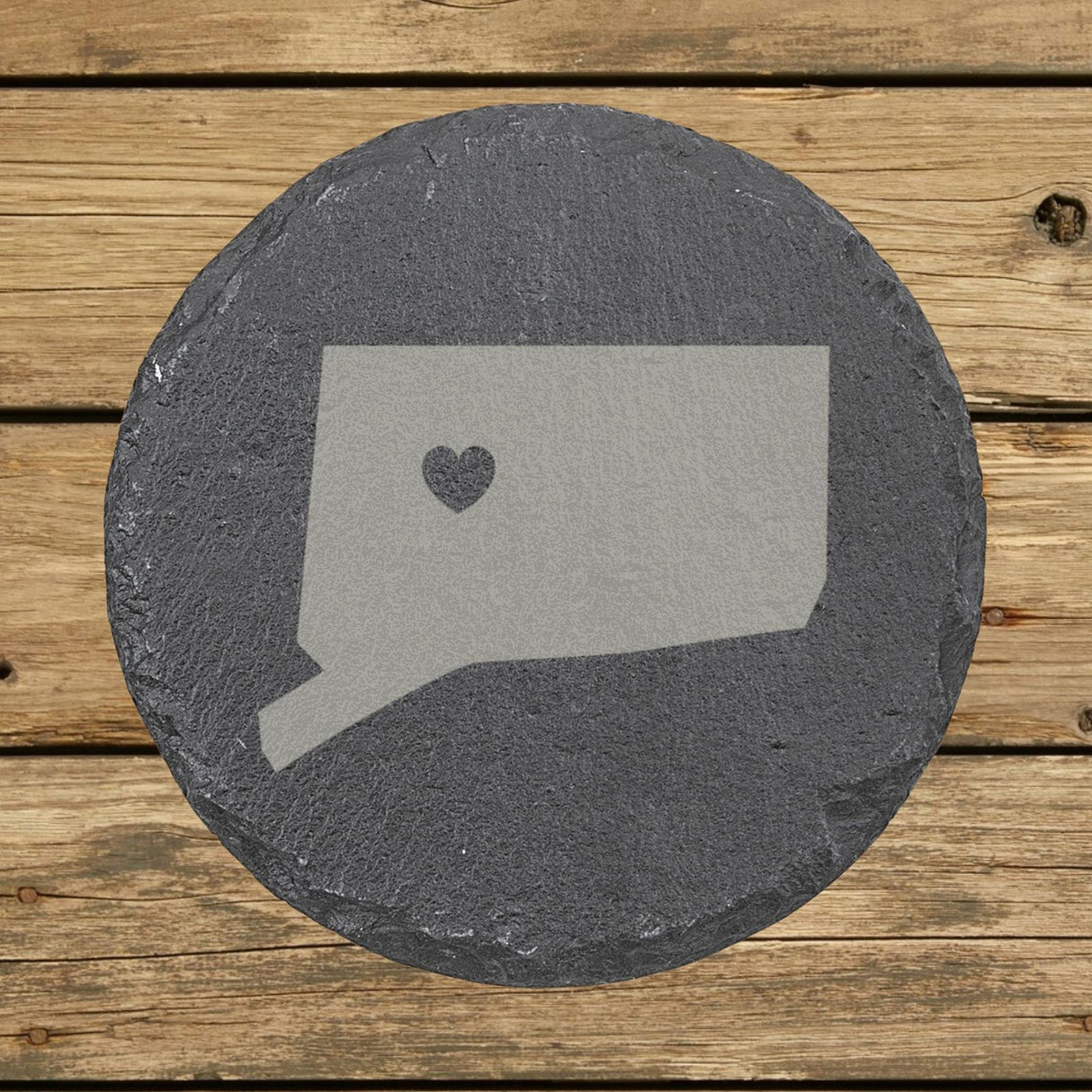 Connecticut round slate coaster engraved with the state shape and a heart