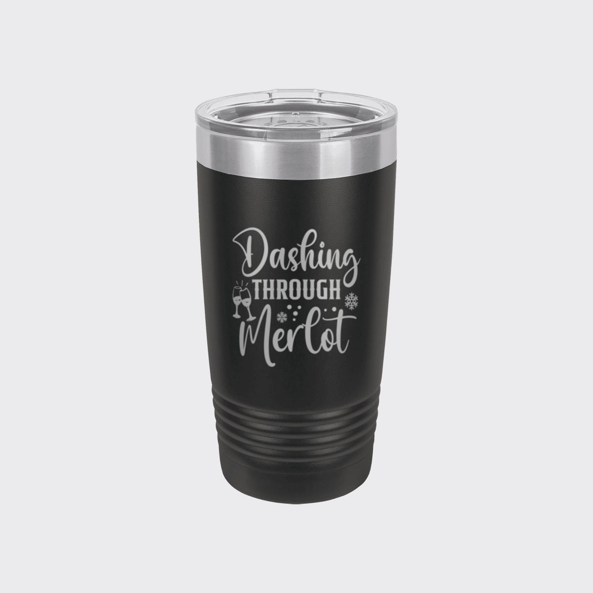 Black 20 oz tumbler laser engraved with "Dashing Through Merlot"