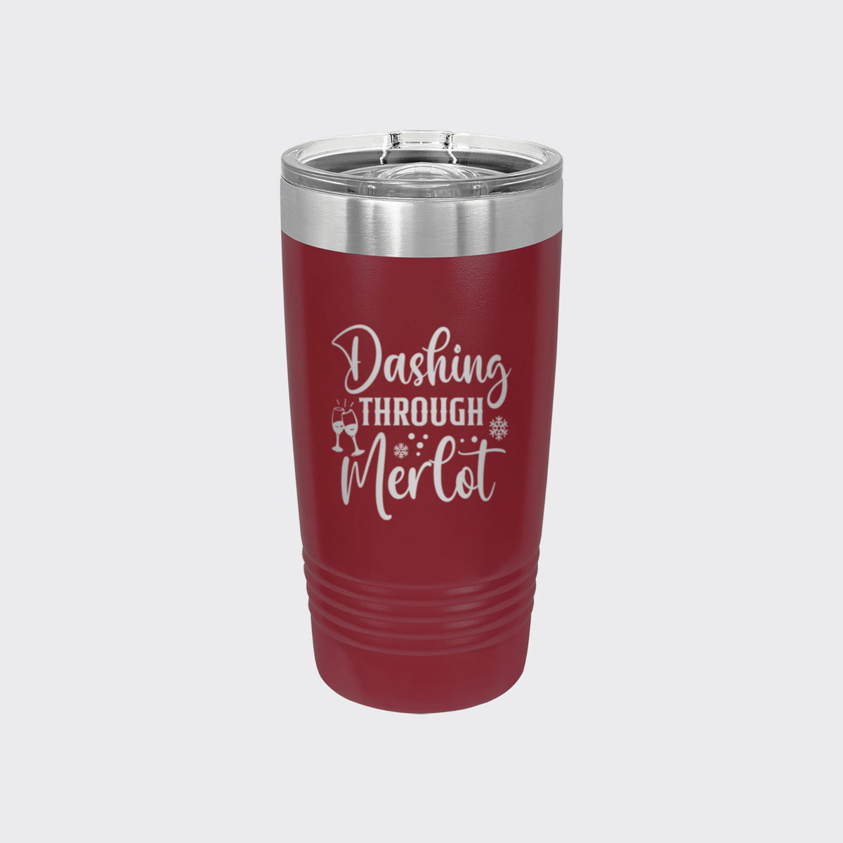 Maroon 20 oz tumbler laser engraved with "Dashing Through Merlot"