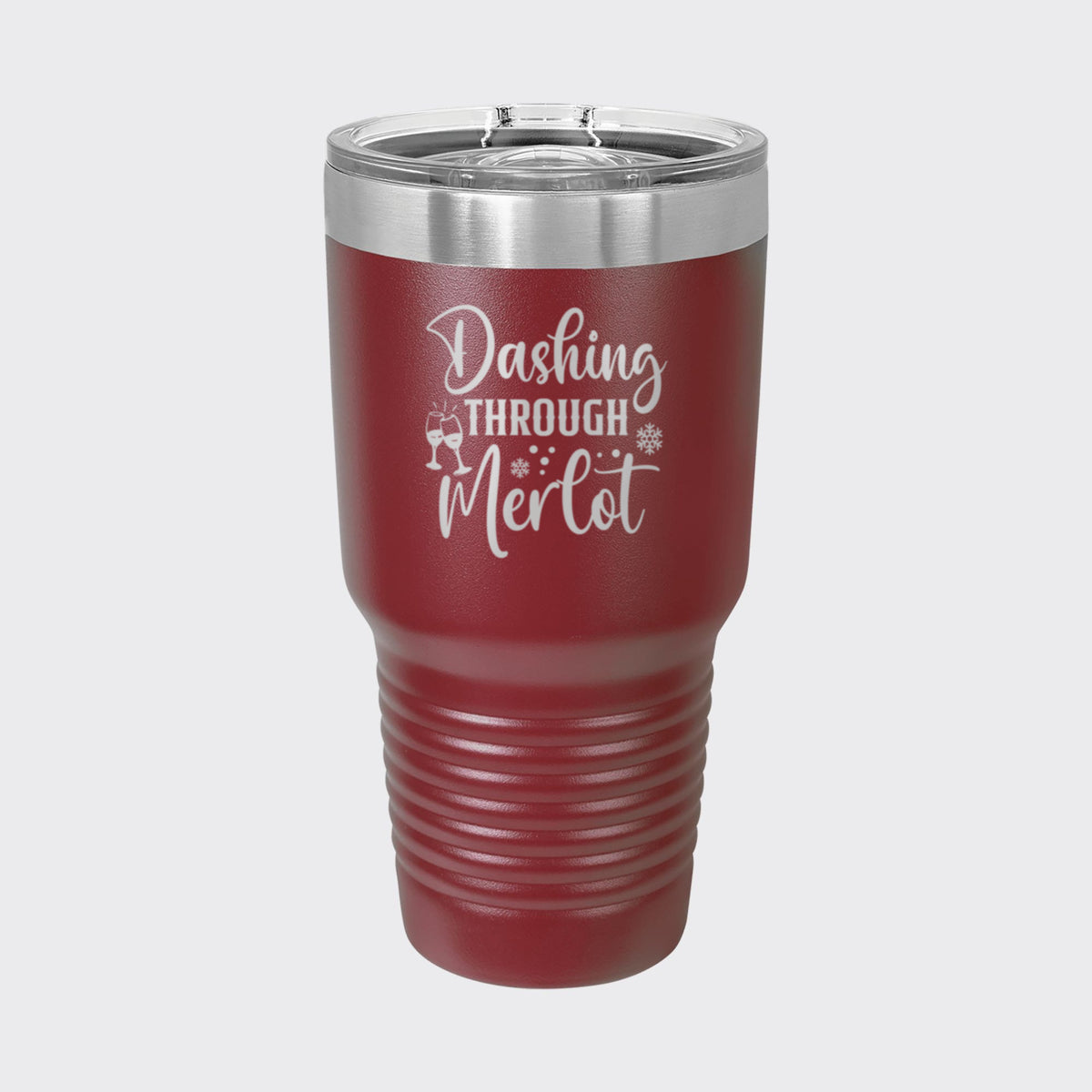 Maroon 30 oz tumbler laser engraved with "Dashing Through Merlot"