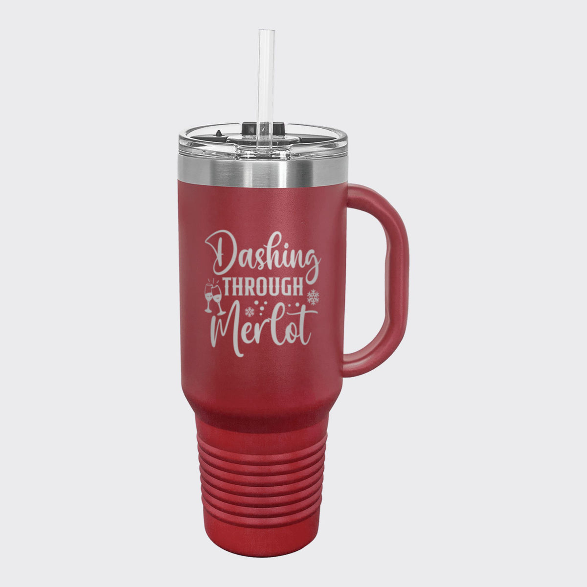 Maroon 40 oz tumbler with handle and straw laser engraved with "Dashing Through Merlot"