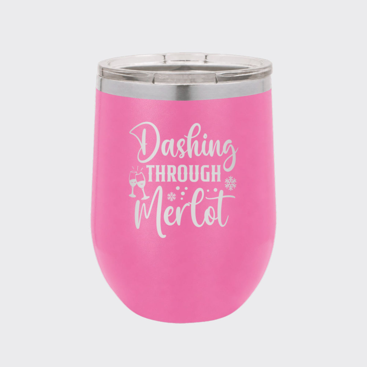 Pink 12 oz stemless wine tumbler laser engraved with "Dashing Through Merlot"
