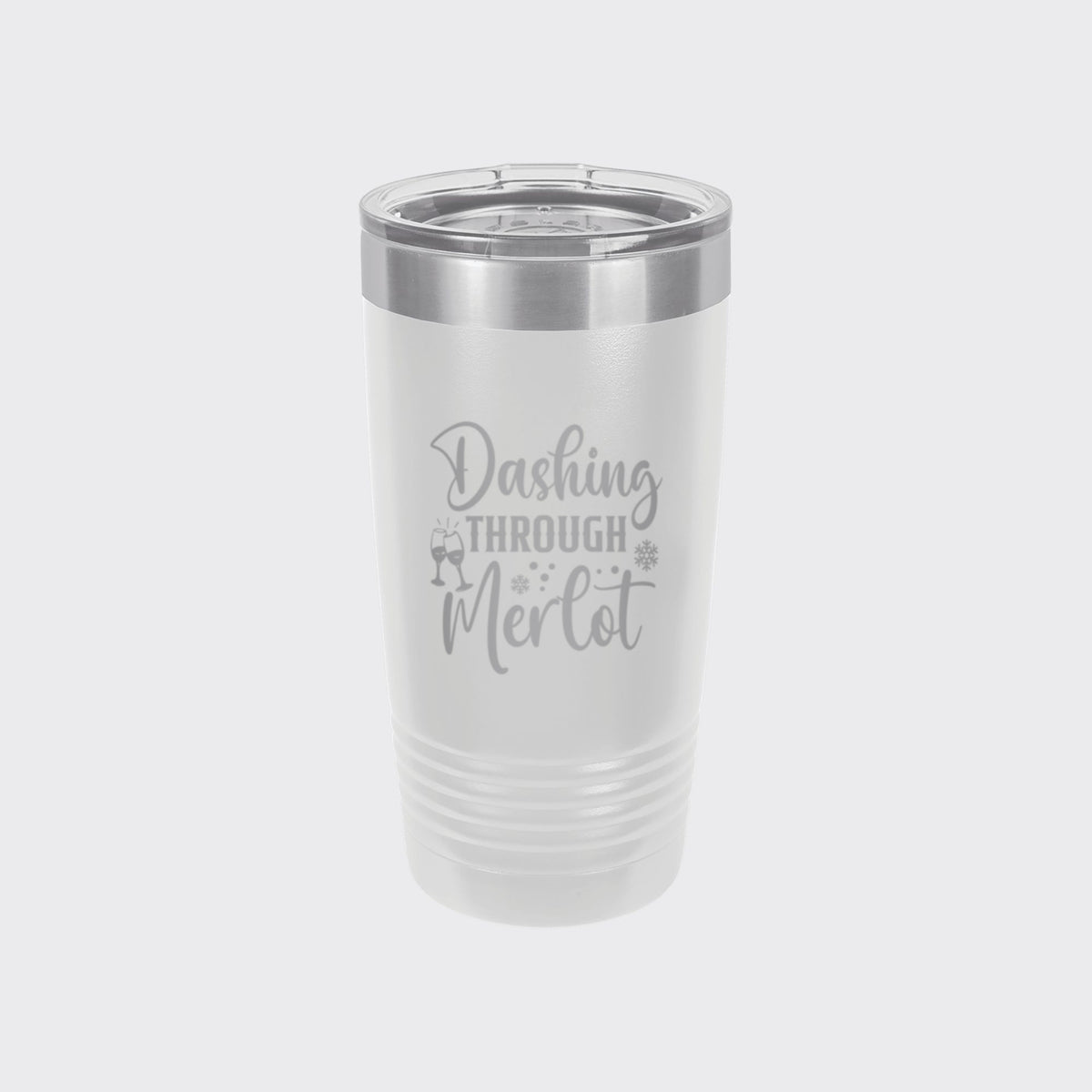 White 20 oz tumbler laser engraved with "Dashing Through Merlot"