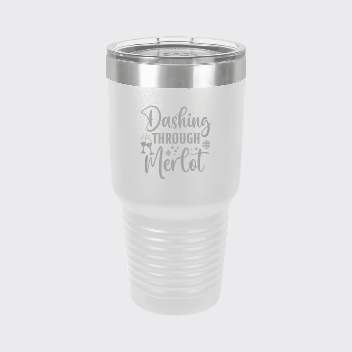 White 30 oz tumbler laser engraved with "Dashing Through Merlot"