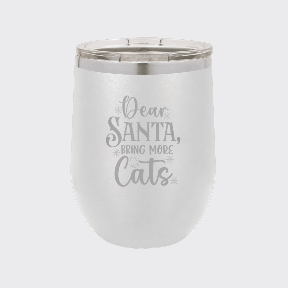 White 12 oz stemless wine tumbler laser engraved with "Dear Santa, Bring More Cats"