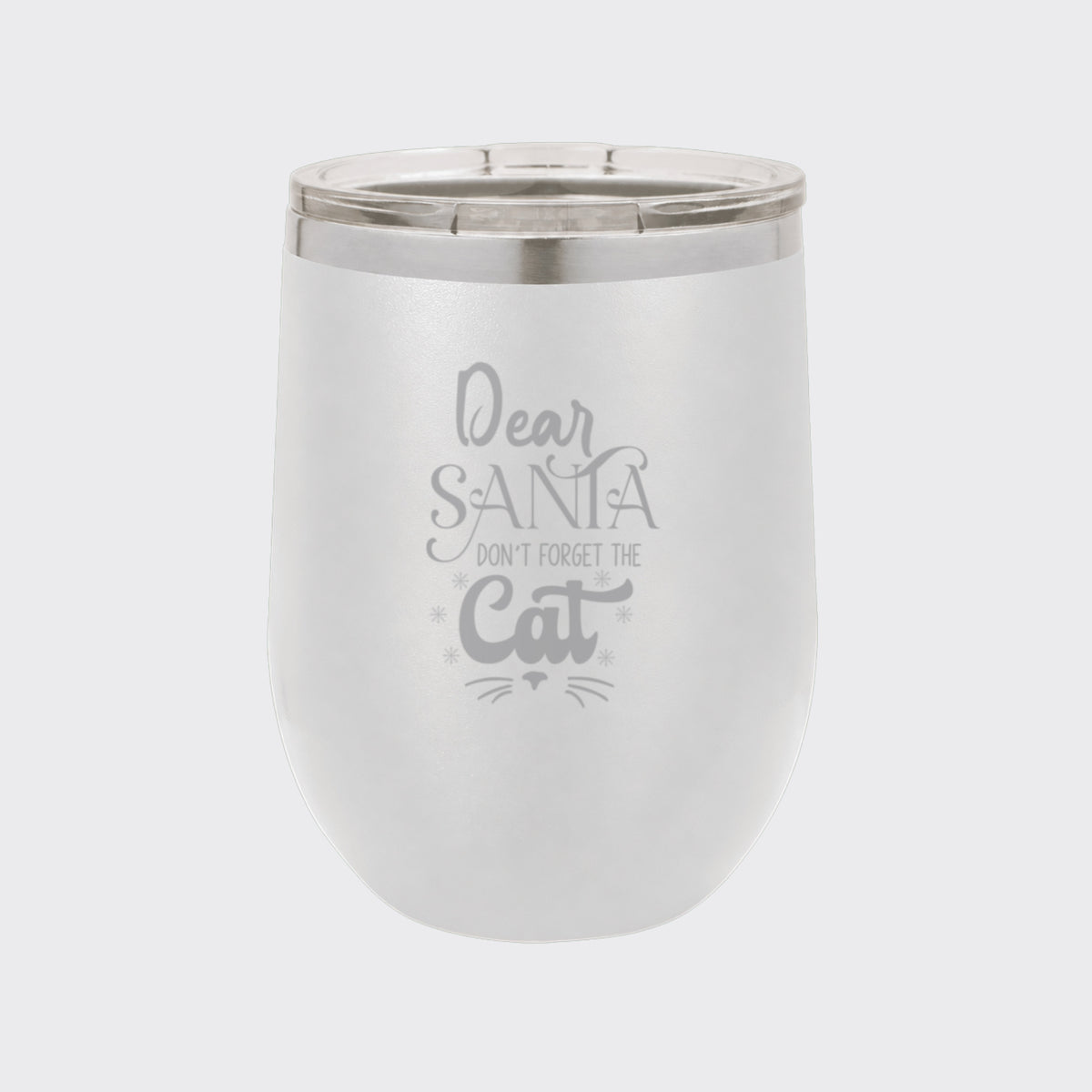 White 12 oz stemless wine tumbler laser engraved with "Dear Santa, Don't Forget the Cat"