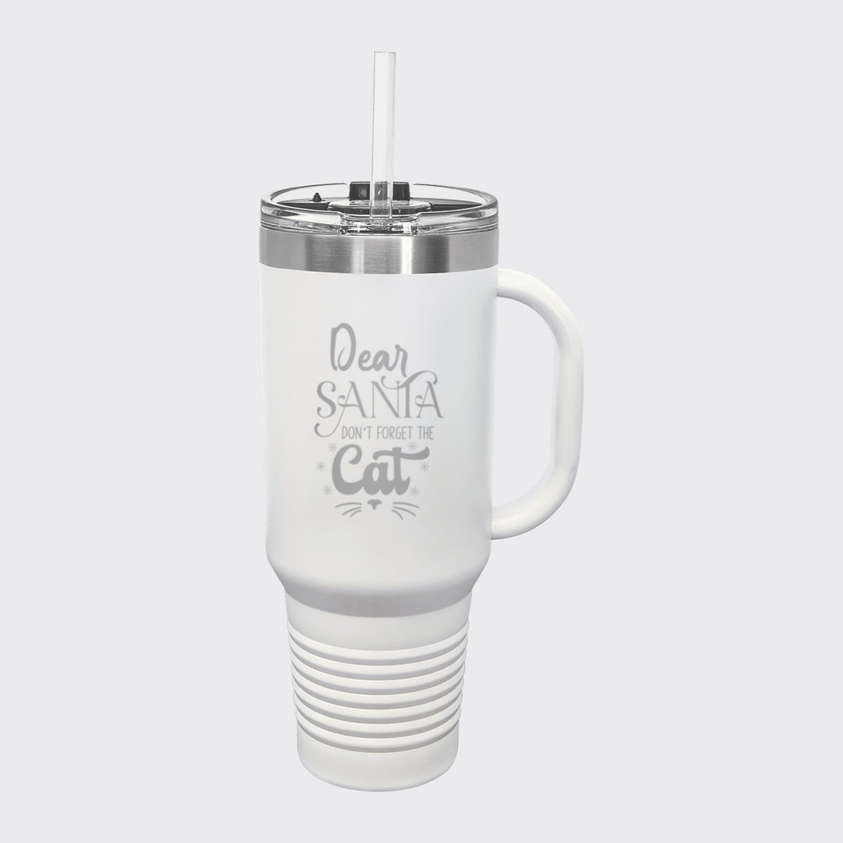 White 40 oz tumbler with handle and straw laser engraved with "Dear Santa, Don't Forget the Cat"