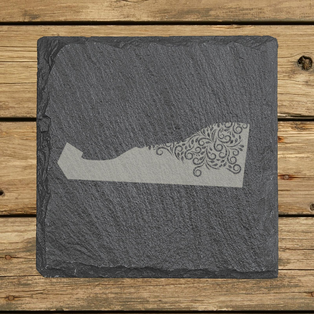 Delaware square slate coaster engraved with the state shape in ornate floral scrollwork