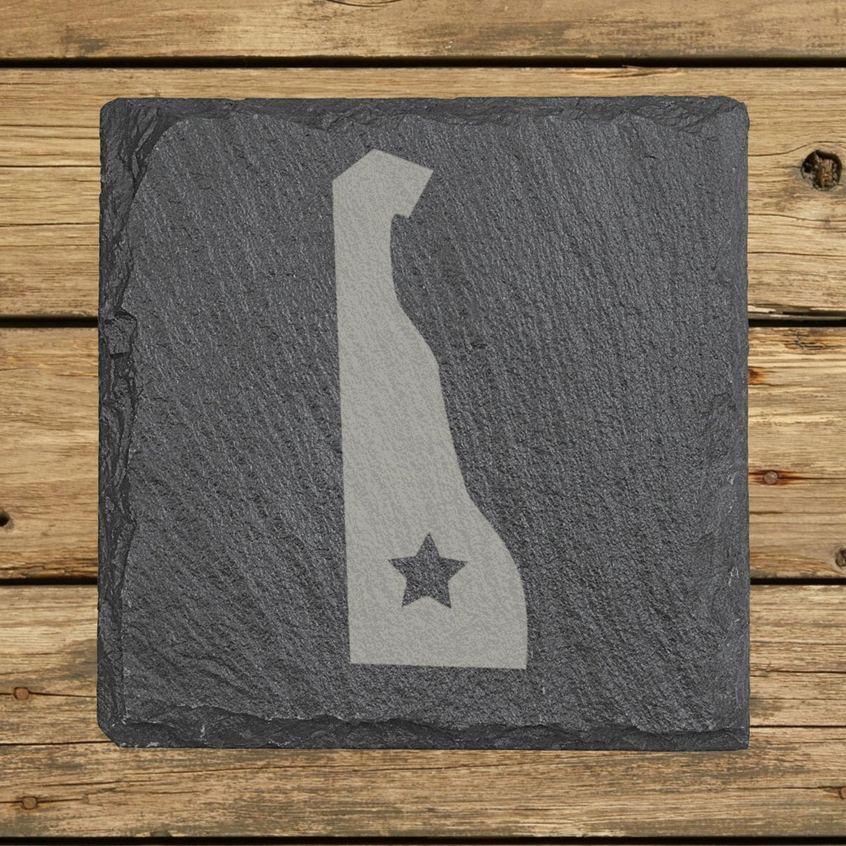 Delaware square slate coaster engraved with the state shape and a star