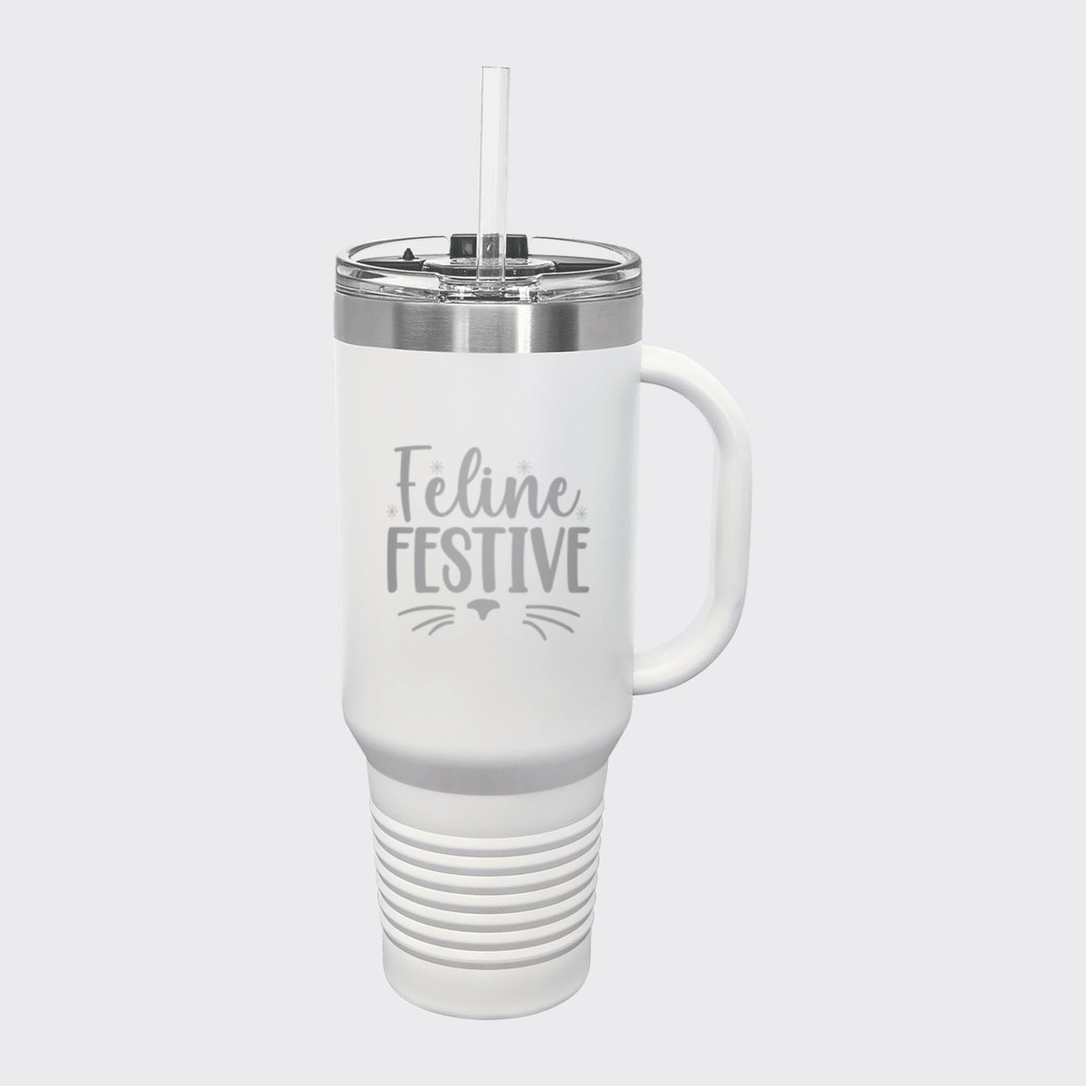 White 40 oz tumbler with handle and straw laser engraved with "Feline Festive"