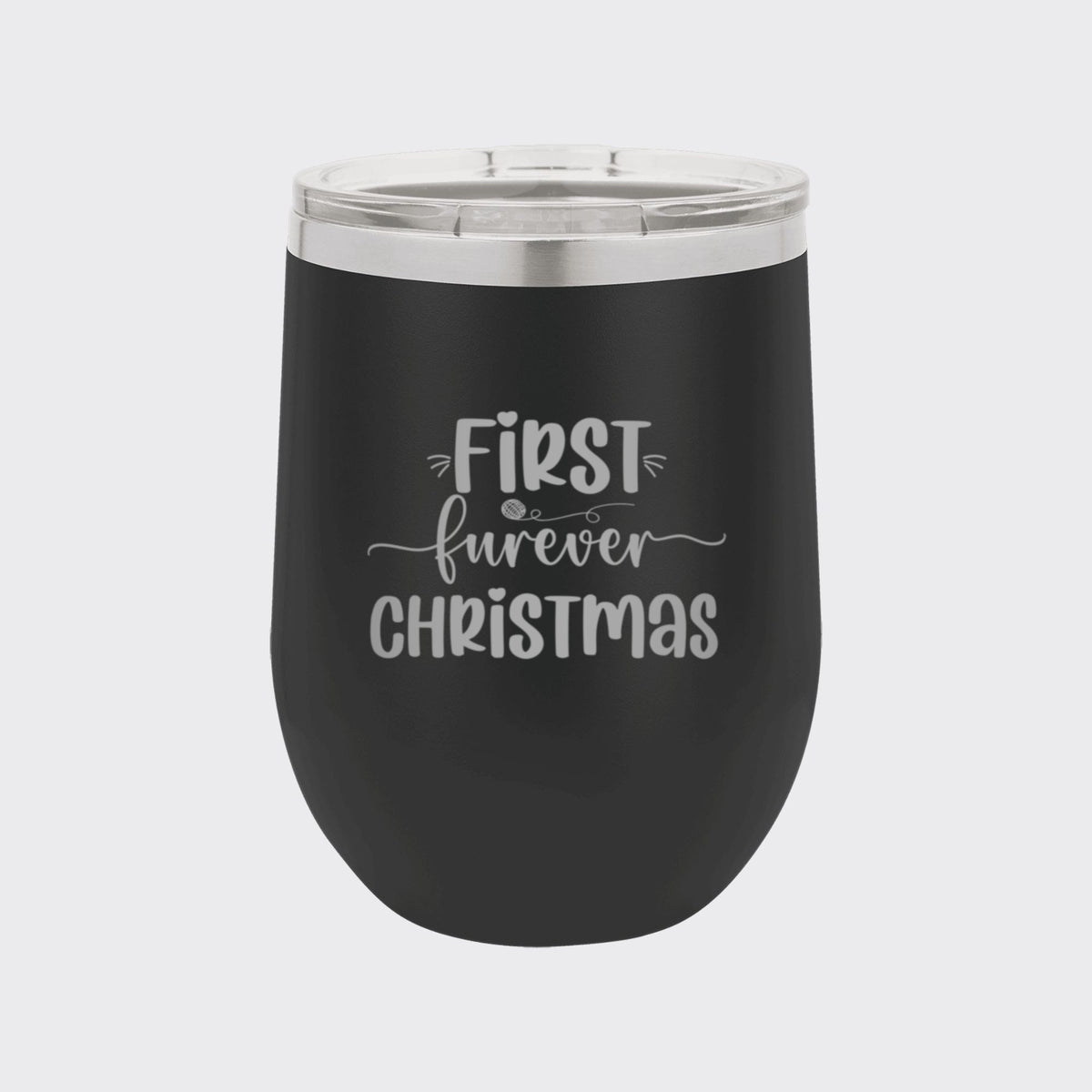 Black 12 oz stemless wine tumbler laser engraved with "First Furever Christmas"