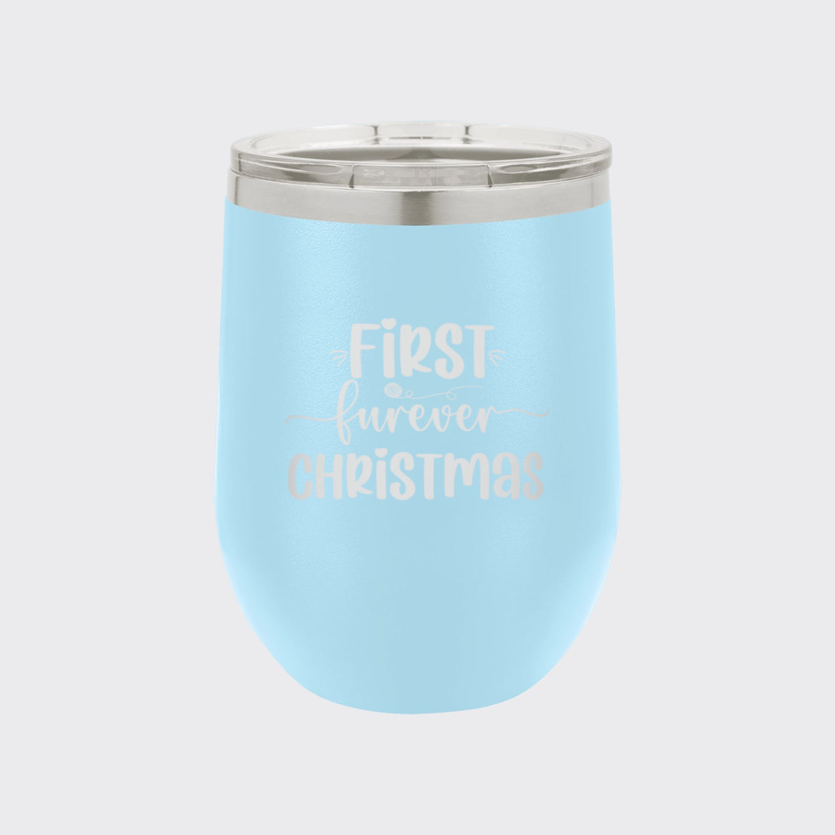 Light Blue 12 oz stemless wine tumbler laser engraved with "First Furever Christmas"