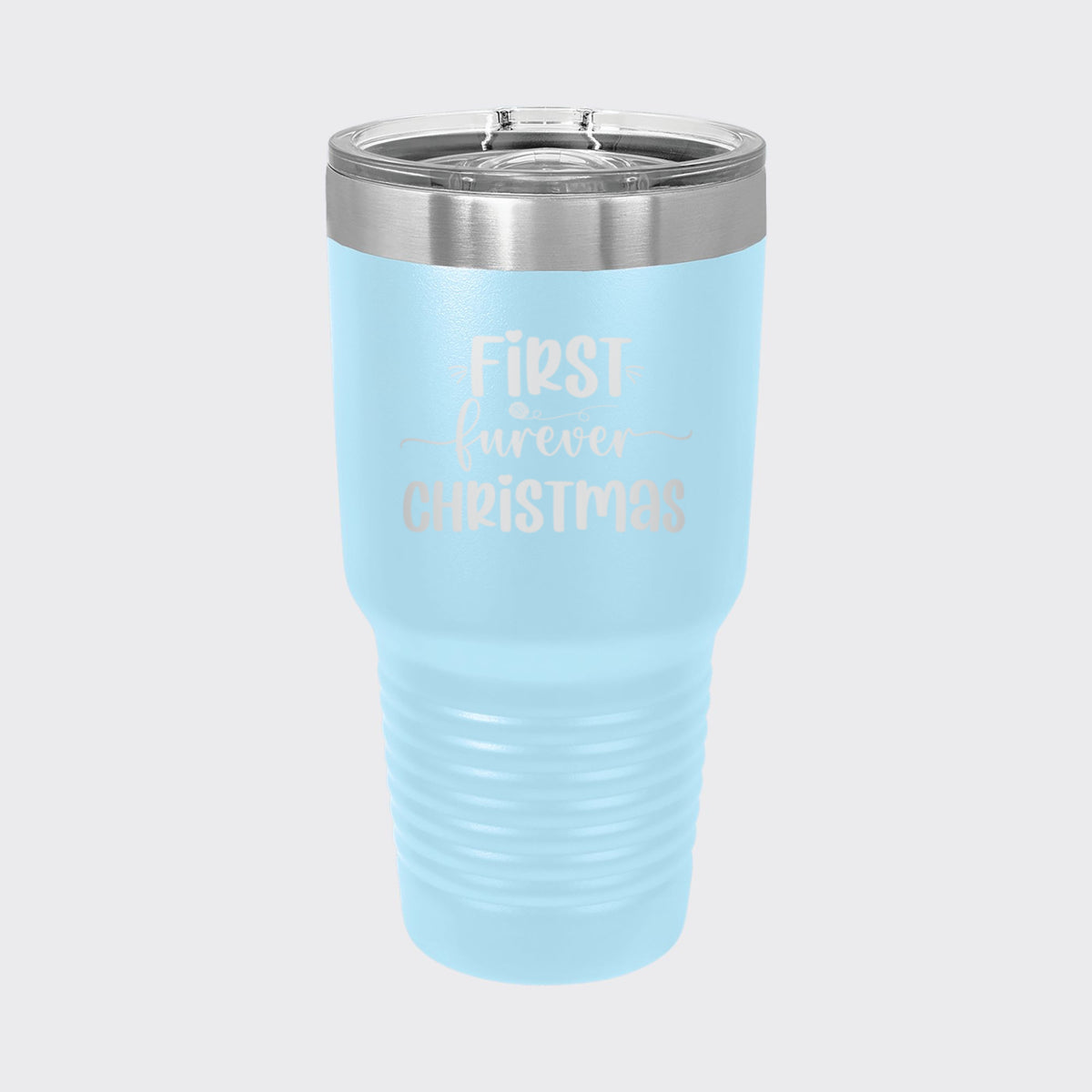 Light Blue 30 oz tumbler laser engraved with "First Furever Christmas"