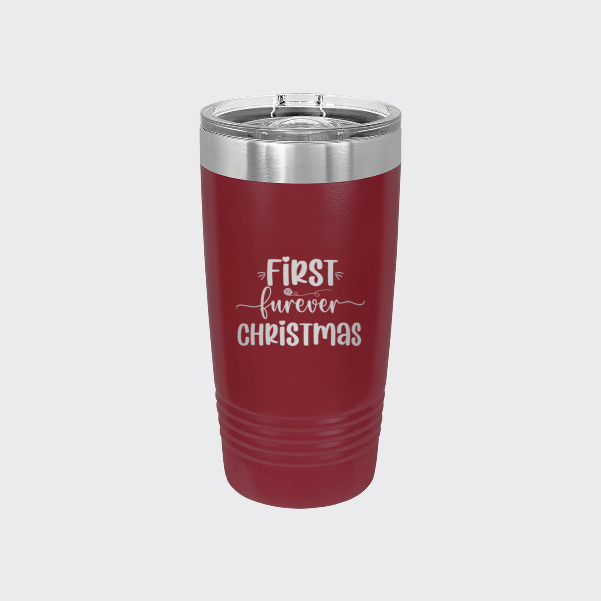 Maroon 20 oz tumbler laser engraved with "First Furever Christmas"