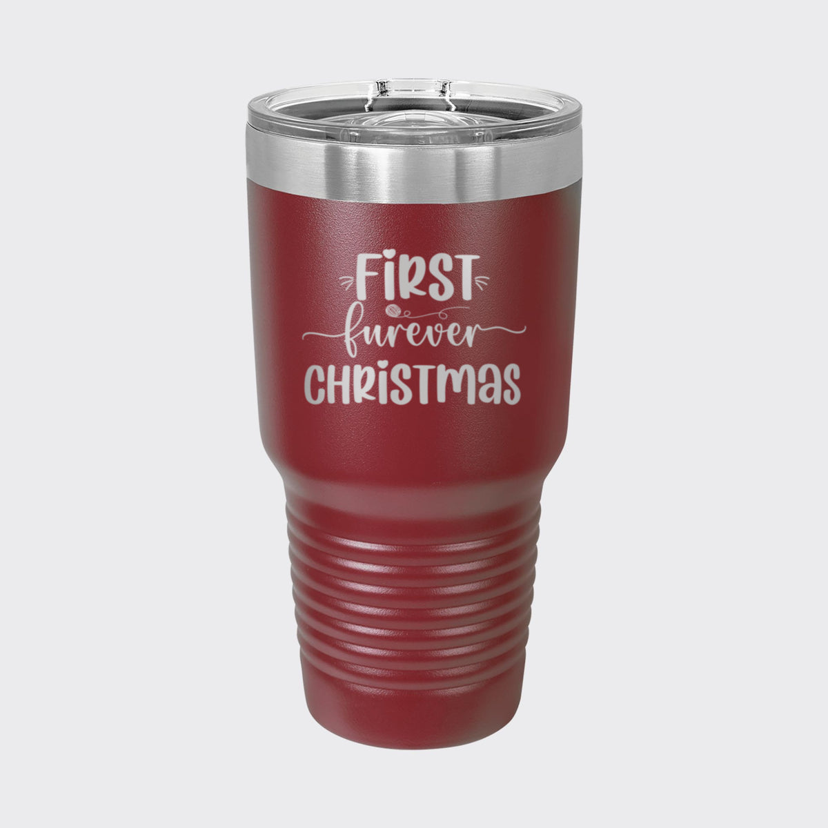 Maroon 30 oz tumbler laser engraved with "First Furever Christmas"