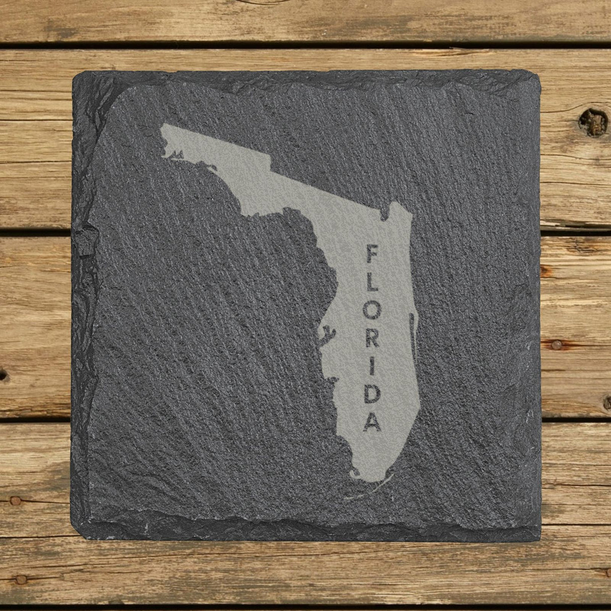 Florida square slate coaster with the engraved state shape and FLORIDA running vertically