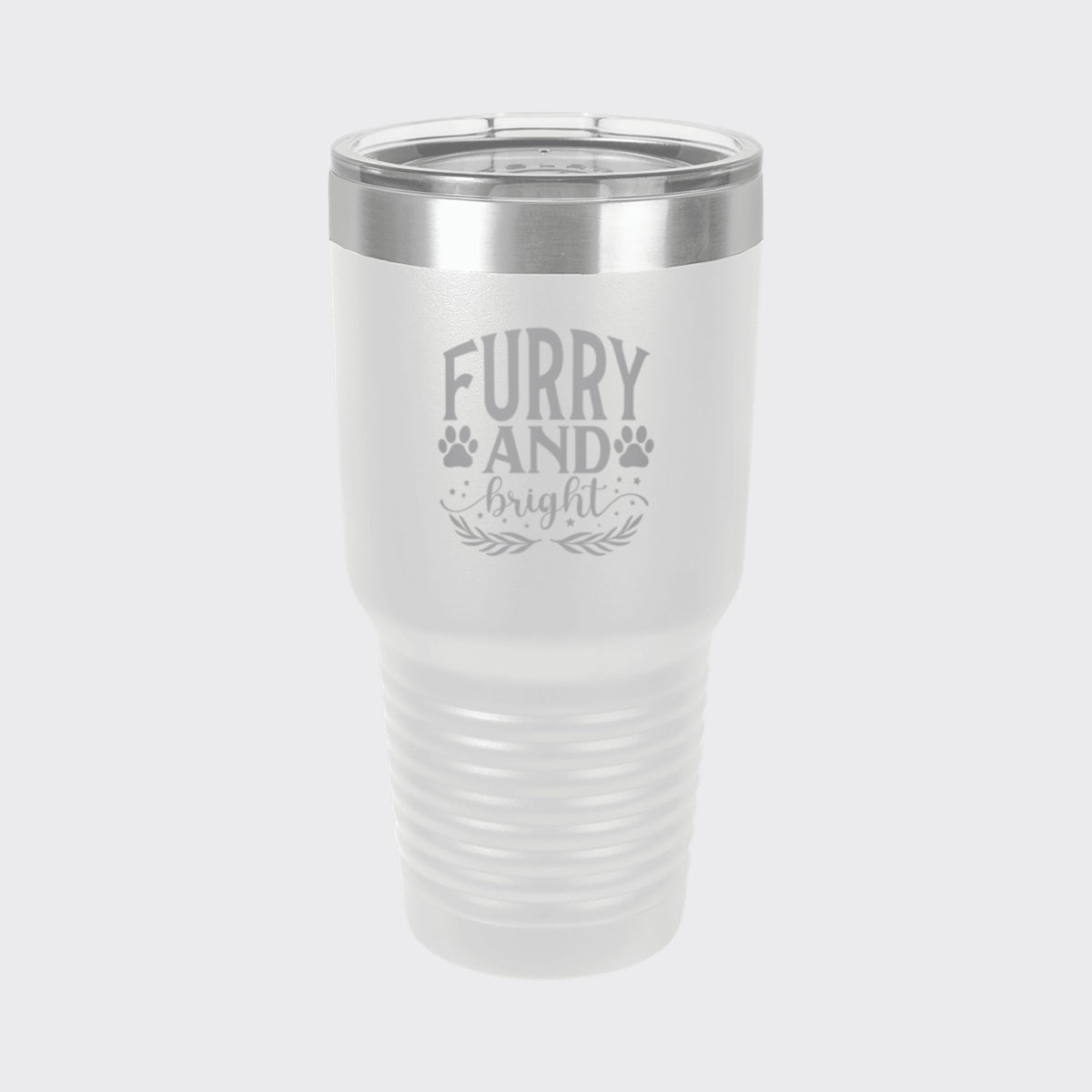White 30 oz tumbler laser engraved with "Furry and Bright"