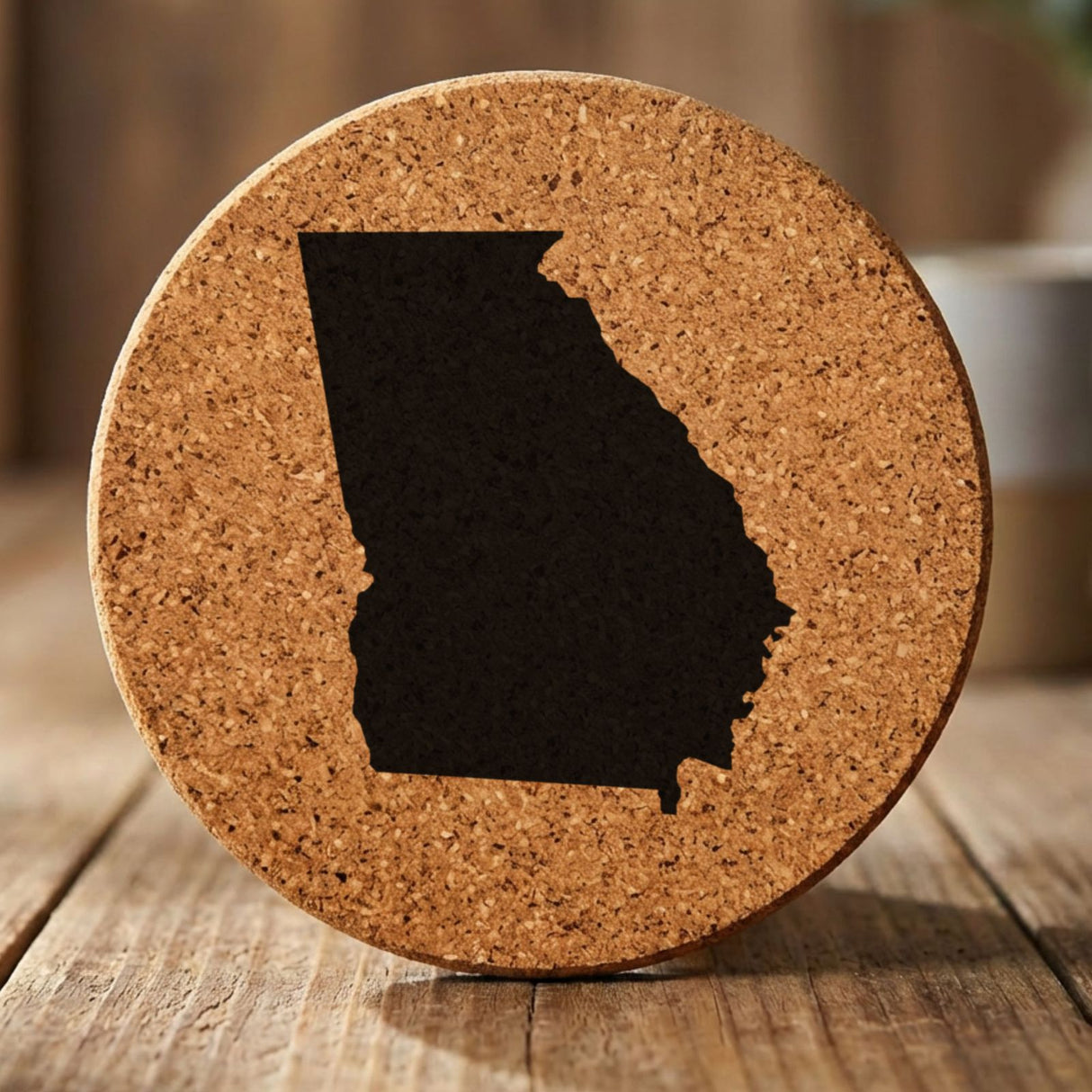 Georgia round cork coaster with the full state shape engraved