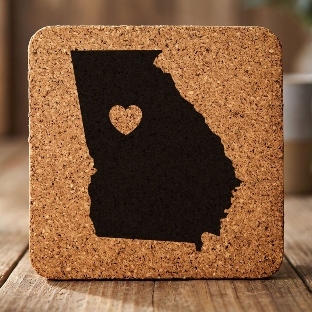 Georgia square cork coaster engraved with the state shape and a heart