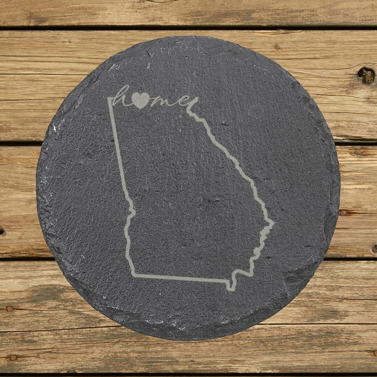 Georgia round slate coaster engraved with the state outline and home in script with a heart