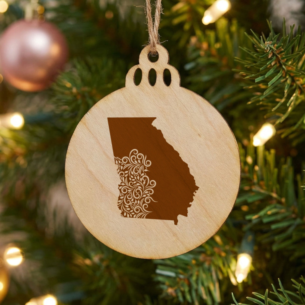 Georgia round wood Christmas ornament engraved with the state shape in ornate floral scrollwork