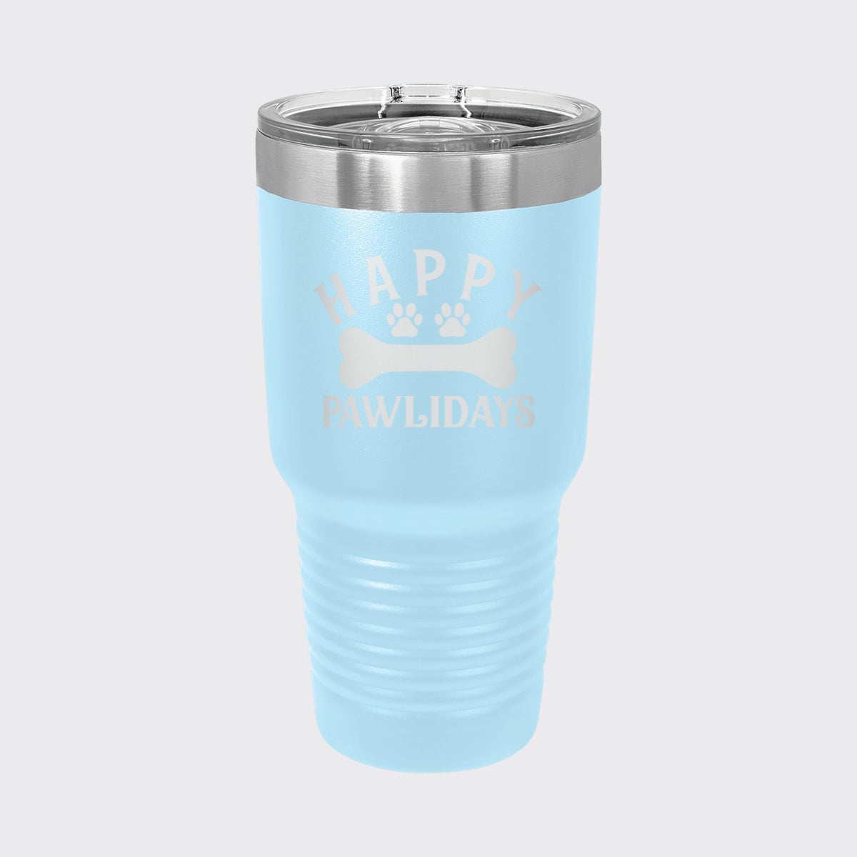 Light Blue 30 oz tumbler laser engraved with "Happy Pawlidays"