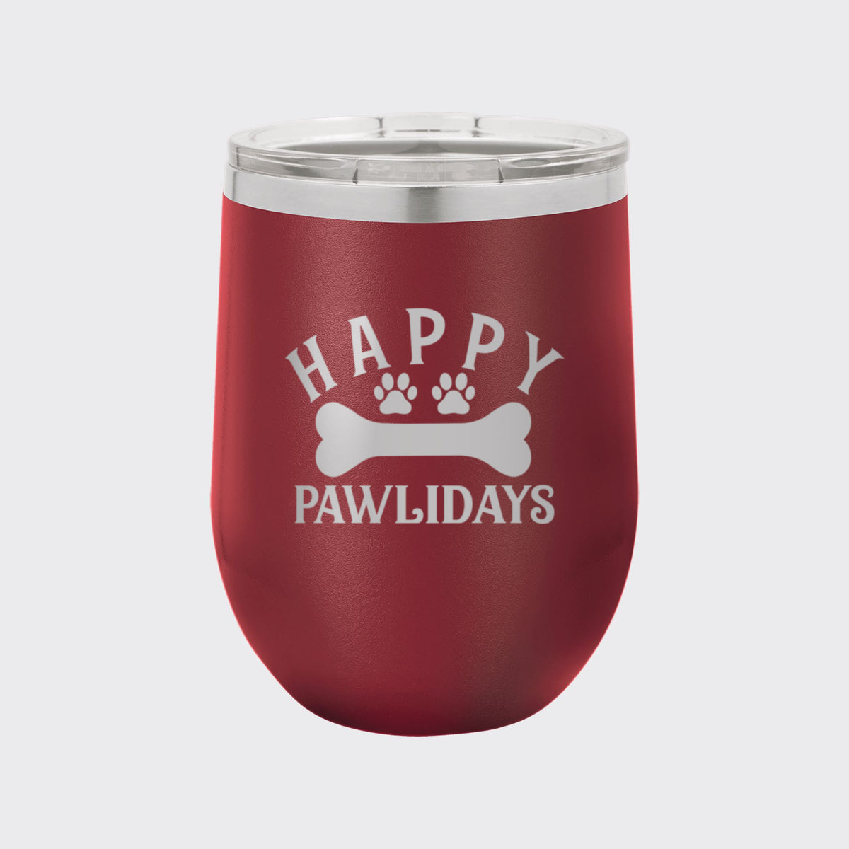 Maroon 12 oz stemless wine tumbler laser engraved with "Happy Pawlidays"