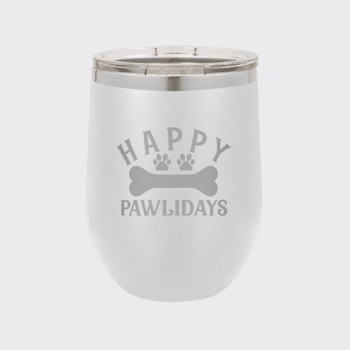 White 12 oz stemless wine tumbler laser engraved with "Happy Pawlidays"