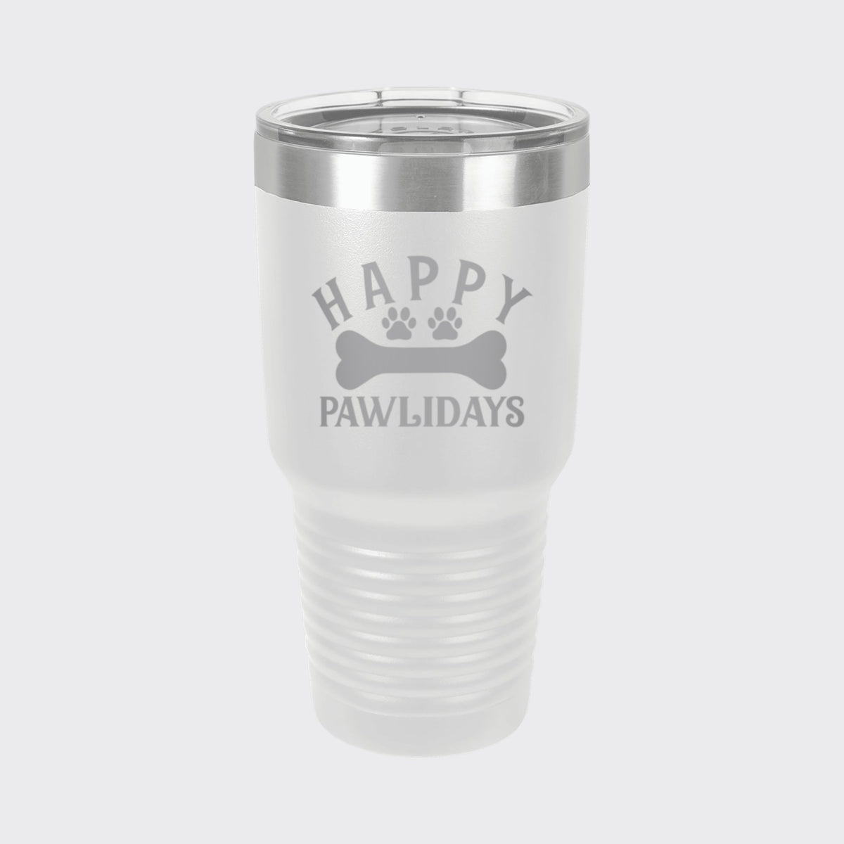 White 30 oz tumbler laser engraved with "Happy Pawlidays"