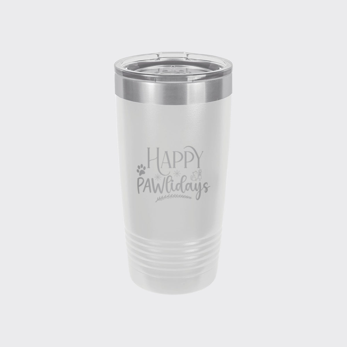 White 20 oz tumbler laser engraved with "Happy Pawlidays"